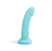 The Nightfall Smooth 7 Inch Teal Glitter Silicone Dildo with Suction Cup stands upright on a flat white background, showcasing its vibrant glittery finish and versatile design, ideal for prostate or g-spot play.