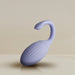 The Niya Rechargeable Kegel Exerciser and Vibrator with Remote is a light purple, oval-shaped massager featuring a ribbed texture and a curved handle, shown against a neutral beige background.