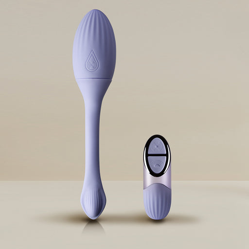 The Niya Rechargeable Kegel Exerciser and Vibrator with Remote, featuring a purple silicone textured oval head and long handle, is shown alongside its matching two-button wireless remote on a neutral background for pelvic floor strengthening.