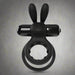 The O Hare Deep Rumbling Vibrating Beginner Couples' Cock Ring, a black silicone adult toy with bunny ears and a cylindrical attachment, is displayed against a plain gray background.