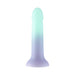 The Ombre Curve Smooth Slim Liquid Silicone 6 Inch Dildo, featuring a flared suction cup base and fading from light teal to lavender, stands upright against a white background.