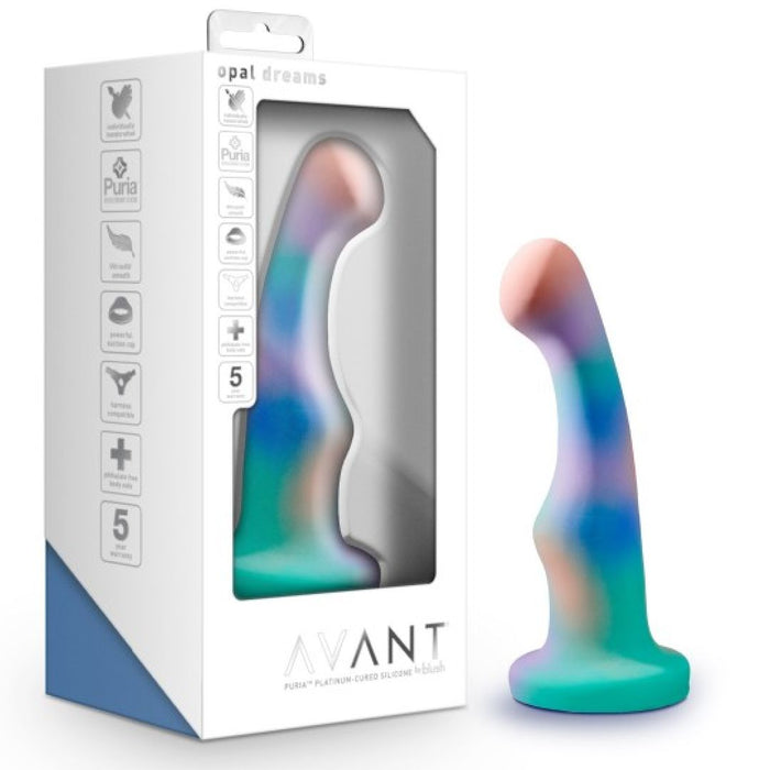 The Opal Dreams Slim 6 Inch Blue Ombre G Spot Dildo stands upright by its white and blue box, which highlights its strap-on harness compatibility along with Avant branding and feature icons.