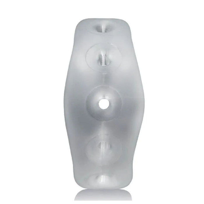 A transparent cylindrical object with a slightly hourglass shape, featuring three evenly spaced small holes along its length and a larger central hole. Crafted from a super-soft silicone blend for long-wear comfort, its smooth and slightly reflective surface ensures both style and function: the Oxballs Air Flow Light Stretchy Cock Ring - Clear by Oxballs.