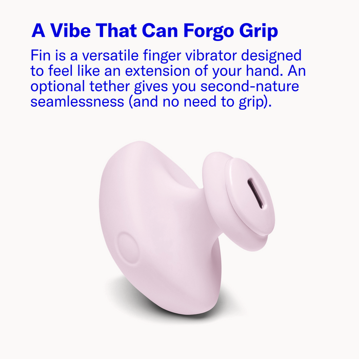 Light pink, compact silicone finger vibrator with a removable tether loop for hands-free, precise stimulation.