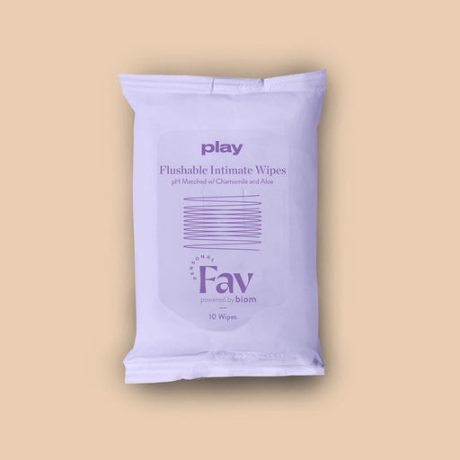 Personal Fav Play Flushable Intimate Wipes 10-Pack are gentle, pH balanced wipes with chamomile and aloe, packaged against a beige background. Each pack contains 10 wipes and is labeled "Fav powered by biom.