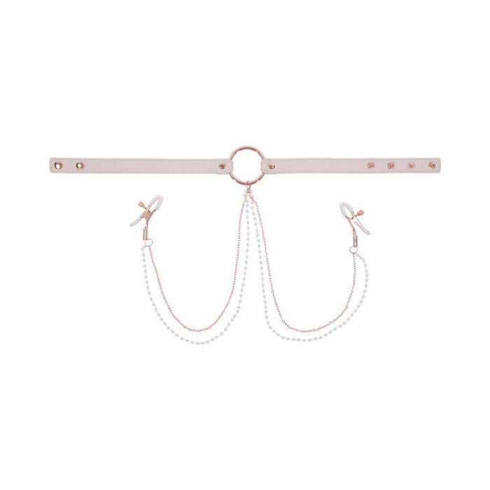 The Peaches 'n Cream Collar and Nipple Clamps by Sportsheets features a white adjustable collar with a central metal ring and rose gold hardware. Two chains decorated with small white beads extend to clips on either end, resembling nipple clamps. The collar's size can be adjusted using multiple snap buttons, providing an elegant and delicate design.