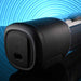 The Playboy Side Piece Heated Sliding Stroker is a sleek black cylindrical toy with a soft, rounded cap featuring the Playboy bunny logo, shown against a vibrant blue circular pattern background.