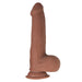 The Realcocks Uncut Fat Dick Sliding Foreskin 9 Inch Dildo features lifelike brown silicone, dual density, realistic veins, a molded testicle, sliding foreskin, and a sturdy suction cup base for hands-free play.