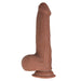 The Realcocks Uncut Fat Dick Sliding Foreskin 9 Inch Dildo, made from brown dual density silicone with lifelike veins, a suction cup base, and realistic testicles, stands upright against a white background.