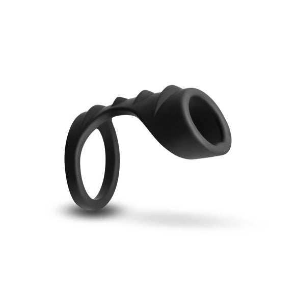 The Renegade Bolster Silicone Penis Support Harness is a black silicone ring with a curved, textured extension for erection enhancement, shown on a white background.