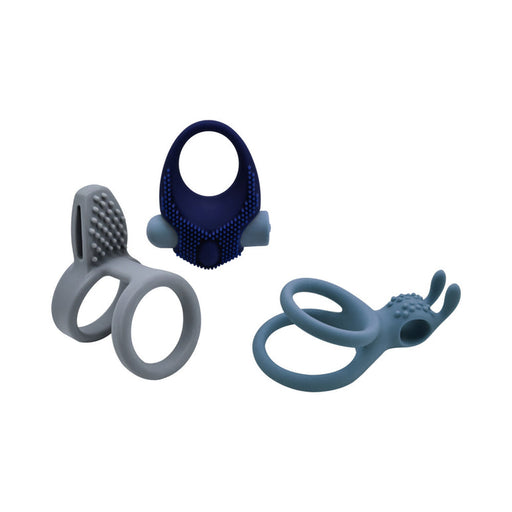 The Rockin' Rumbler Vibrating Penis Enhancers Set of 3 includes gray and dark blue silicone rings with textured surfaces and unique shapes, displayed on a plain white background.