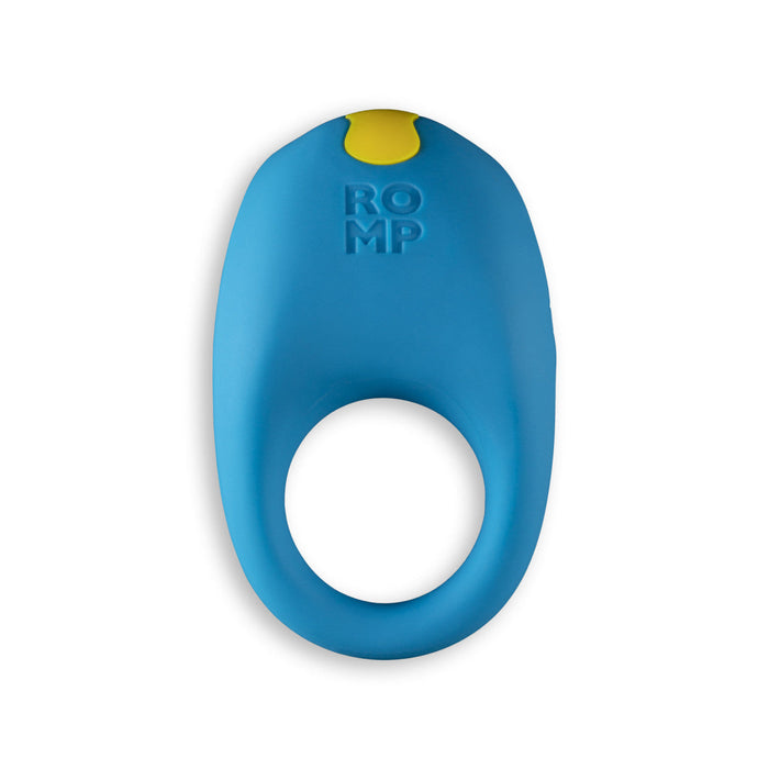 The Romp Juke Beginner-Friendly Vibrating Couples Cock Ring is a blue silicone ring with a yellow button labeled "ROMP" on top, designed to boost erection firmness, shown against a white background.