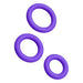 The Romp Remix Easy to Use Cock Ring Trio features three purple stretchy silicone rings of different sizes, displayed on a white background, designed to help support longer-lasting erections.