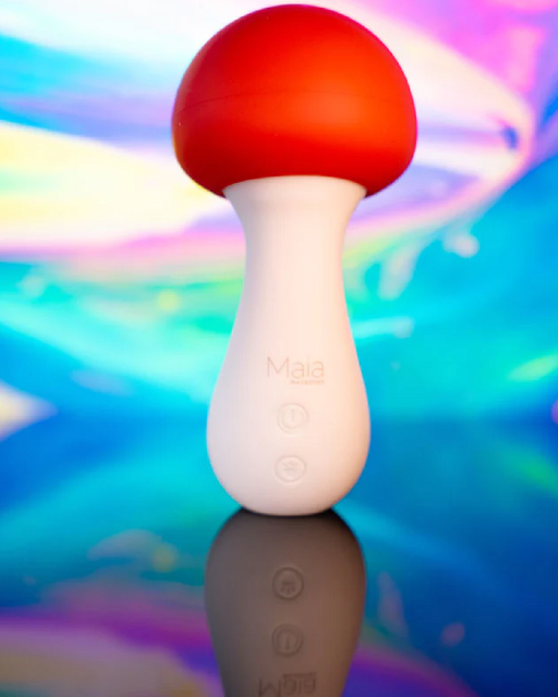 Shroomie Mushroom Shaped Mini Wand Vibrator on colorful background 