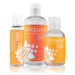 Three bottles of Sliquid Sizzle Natural Stimulating Lubricant, featuring orange and white labels in different sizes, are displayed side by side on a white background.