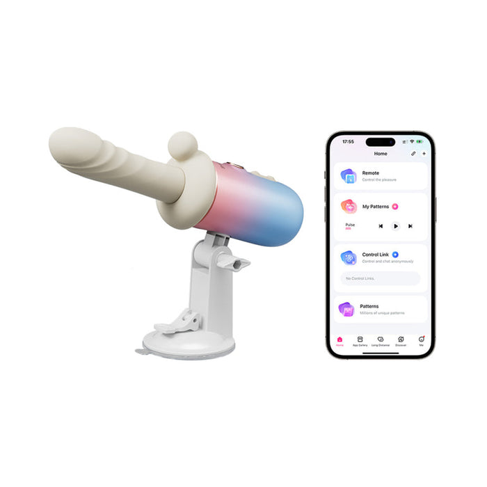 The Spinel App-Controlled, Multi-Attachment Thrusting, Vibrating & Heating Dildo Machine in pink and blue is pictured next to a smartphone displaying its remote control app for hands-free operation.