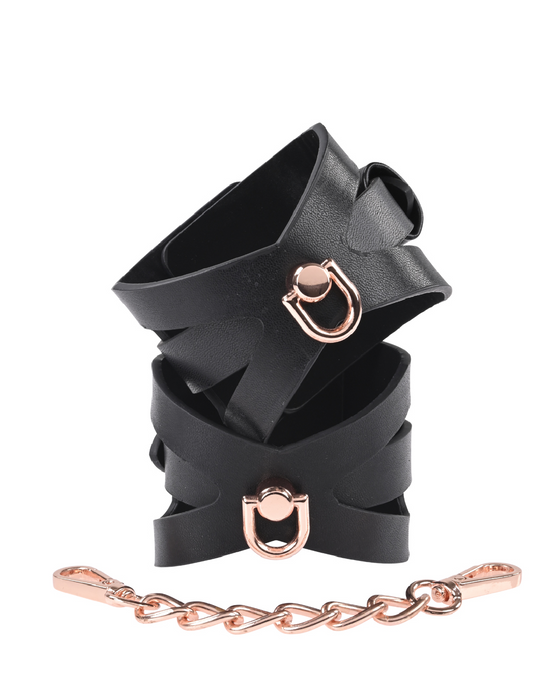 Sex And Mischief Brat Handcuffs stacked on top of each other 