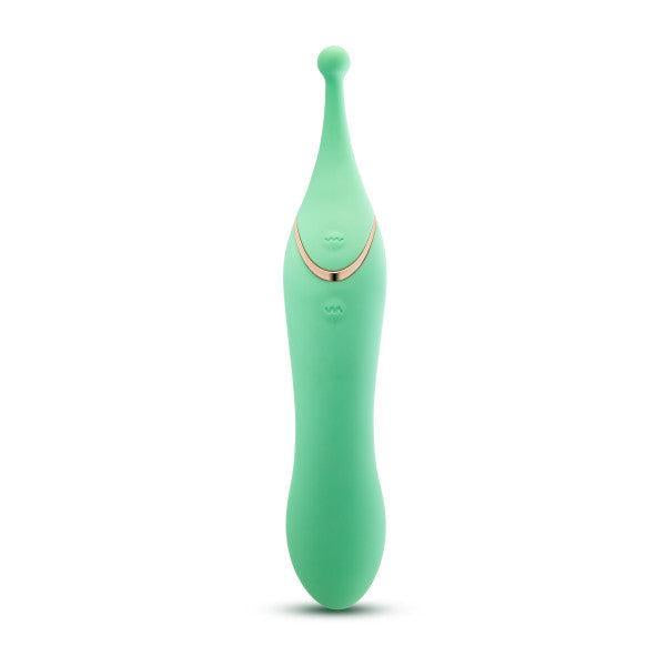 The Stella Double Ended G-Spot & Clitoral Vibrator features a green silicone design with a long, tapered body, rounded tip for pinpoint stimulation, gold accents, and subtle wave patterns set against a white background.