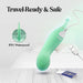 The Stella Double Ended G-Spot & Clitoral Vibrator is shown charging via USB on a white bed next to a passport. Text reads "Travel-Ready & Safe" with a highlight on "IPX7 Waterproof.