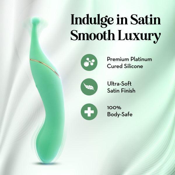The Stella Double Ended G-Spot & Clitoral Vibrator, made from premium platinum-cured silicone with an ultra-soft satin finish, is shown on a satin background. Its double-ended design offers versatile, body-safe pinpoint stimulation.