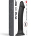 Box for the Strap-On-Me Smooth Semi-Realistic 8 Inch Black Silicone Dildo, featuring product image and diagrams on the side, highlighting its flexibility and use with a strap-on harness for g-spot or prostate stimulation.
