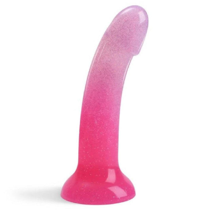 The Sunrise Smooth 7 Inch Pink Ombre Glitter Silicone Dildo with Suction Cup, designed for prostate or G-spot play, features a pink and purple gradient and stands upright on a white background.