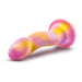 The Sun's Out 7.5 Inch Pink Ombre Silicone G Spot Dildo features a curved shape, flared base, and swirled pink, yellow, and light purple design—ideal for pegging or solo play. Shown against a white background.