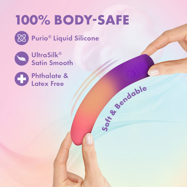 A person bends the Sunset Passion Soft Bendable Bullet Vibrator, a purple and pink device made of UltraSilk satin smooth platinum-cured silicone that’s body-safe, soft, bendable, latex-free, and features powerful vibration modes.