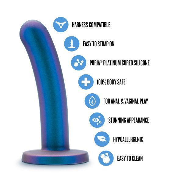 The Surrender Sleek Slim 5.75 Inch Blue Silicone Beginner & Pegging Dildo stands upright, highlighting its hypoallergenic, body-safe, platinum-cured silicone build—harness compatible, easy to clean, and suitable for anal or vaginal use.