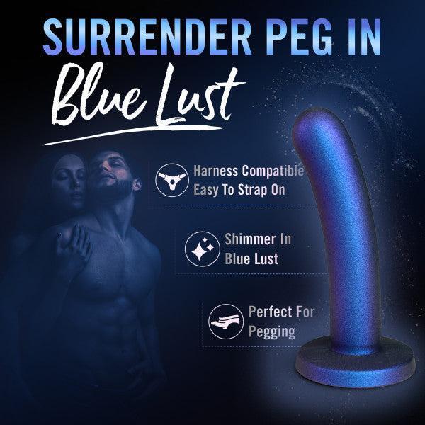 Promotional image of a couple embracing with text: “Surrender Sleek Slim 5.75 Inch Blue Silicone Beginner & Pegging Dildo—harness compatible, easy to strap on, shimmering ‘Blue Lust,’ perfect for anal play & pegging.” Product shown on the right.