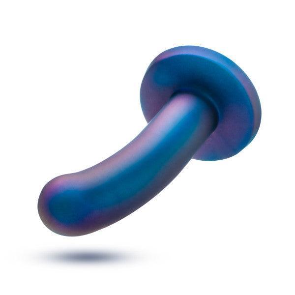 The Surrender Sleek Slim 5.75 Inch Blue Silicone Beginner & Pegging Dildo features a curved shaft and flared base, ideal for anal play or pegging, shown isolated on a white background.