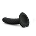 The Temptasia Twist Curved Slim 5 Inch Black Silicone Pegging Dildo features a spiral texture, heart-shaped suction base, is strap-on compatible, great for beginners, and is shown against a plain white background.