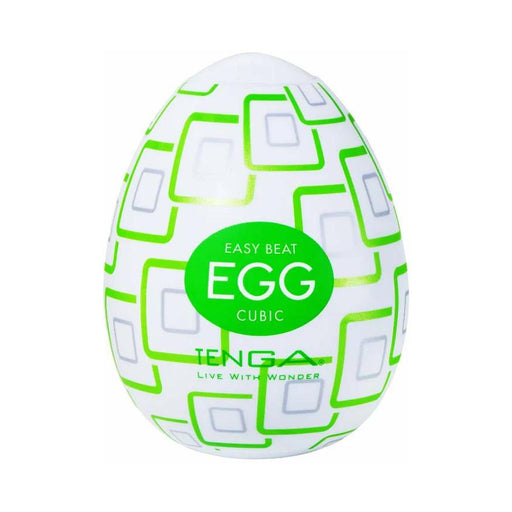 The Tenga Egg Disposable Penis Masturbator - Cubic is a white, egg-shaped travel sex toy featuring a green geometric pattern and discreet design for single-use pleasure.