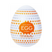 The Tenga Egg Disposable Penis Masturbator - Starry is a white, egg-shaped sleeve with orange and gray star designs, offering a discreet, travel-friendly and disposable option for solo pleasure.