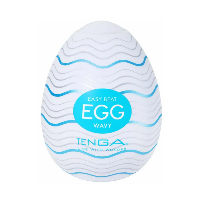 The Tenga Egg Disposable Penis Masturbator - Wavy is a discreet, white, egg-shaped sleeve with blue wavy lines—ideal as a travel-friendly, single-use sex toy.