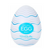 The Tenga Egg Disposable Penis Masturbator - Wavy is a discreet, white, egg-shaped sleeve with blue wavy lines—ideal as a travel-friendly, single-use sex toy.