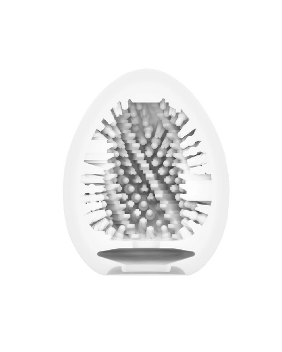 3d-rendered image of a modern, circular pin art toy with pins forming an abstract, symmetrical pattern from the Tenga Egg Disposable Penis Masturbator - Combo Series, isolated on a white background.