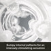 Close-up of The Handy Dream Collection Touch Sleeve’s translucent, bumpy interior. Text below: "Bumpy internal patterns and targeted stimulation for an intensely stimulating sensation.