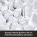 Close-up of translucent, bumpy textures with rounded shapes; overlaid text: “Bumpy internal patterns in The Handy Mermaid Collection Coral Sleeve - Intense Sensations for maximum stimulation.”.