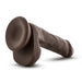 The Top Gun Tommy Lifelike 6 Inch Dark Tone Dildo with Suction Cup features a realistic design, textured details, and a flared base that's harness compatible, shown on a white background.