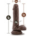The Top Gun Tommy Lifelike 6 Inch Dark Tone Dildo with Suction Cup stands upright, is harness compatible, and features a 4.5" insertable length, 1.4" width, and 4.5" circumference for realistic pleasure.