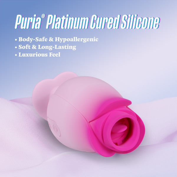The Tulip Trance Licking Sucking Clitoral Vibrator, in pink and magenta platinum-cured silicone, is shown on a pastel background. Body-safe, hypoallergenic, ultra-soft, luxurious—features licking and suction for enhanced clitoral pleasure.