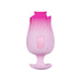 The Tulip Trance Licking Sucking Clitoral Vibrator is a pink, rose-shaped silicone toy with two control buttons on its stem, designed for clitoral pleasure and shown against a white background.