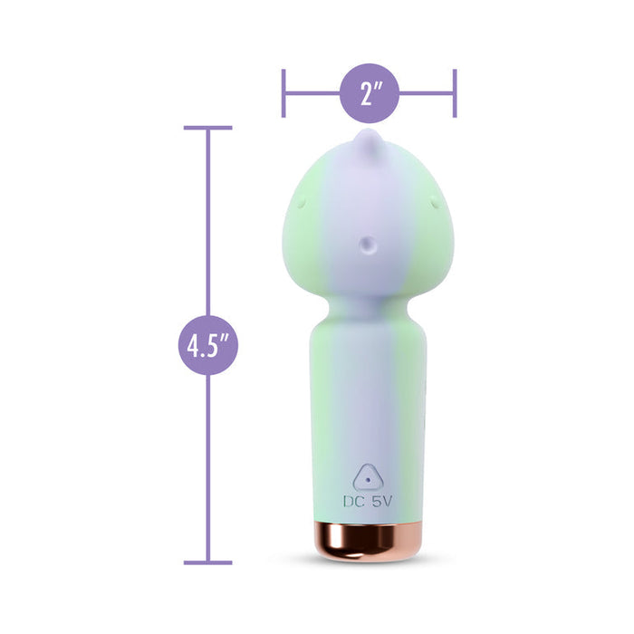 The Unicorn Dreams Mini Wand – Magical Pleasure Awaits is a pastel green and purple vibrator made from body-safe silicone, with a rounded top, button control, metallic base, DC 5V indicator, and measures 4.5" tall by 2" wide.