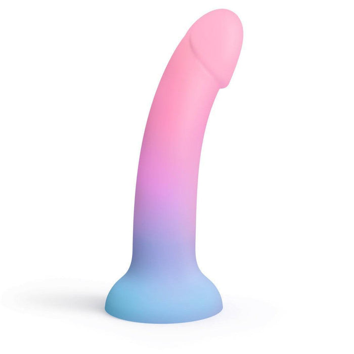 The Utopia Sleek 7 Inch Pink and Blue Ombre Silicone Dildo features a curved shape, realistic tip, and strong suction cup—ideal for g-spot or prostate pleasure.