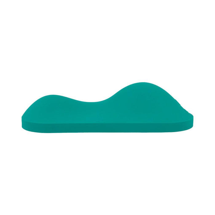 A teal VibePad Intense Ultra Powerful Ride On Hands-Free Humping Vibrator, flat with a wavy top edge like low hills, is shown against a white background—highlighting its sleek, waterproof design.