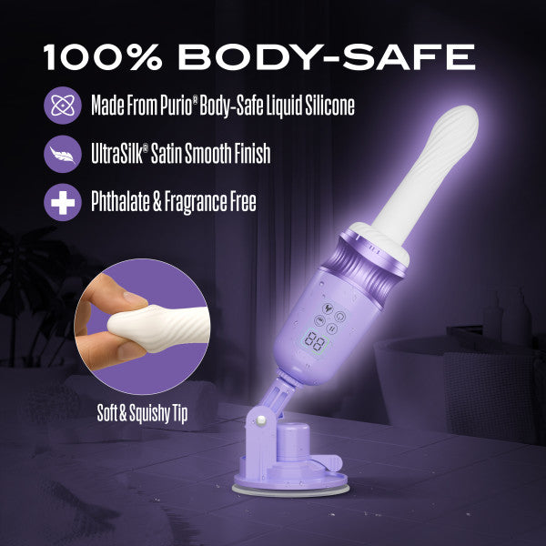 The Violet Vixen Warming Thrusting Vibrator with Suction Mount, shown in purple with a digital display, features body-safe liquid silicone, a satin smooth finish, soft squishy tip, and is phthalate and fragrance free.