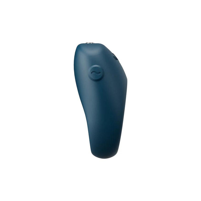 The We-Vibe Pivot 2 is a blue, ergonomic, oval silicone wearable vibrating penis ring for couples with a single circular side button and customizable vibration patterns, shown against a plain white background.