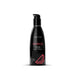 A sleek black bottle of Wicked Aqua Watermelon Flavored Water Based Lubricant 2 oz with a pump top features vibrant red text and a juicy watermelon graphic, offering vegan-friendly refreshment in 60 ml or 2 fl oz.