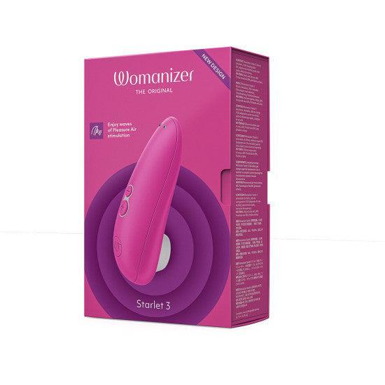 A pink box containing the Womanizer Starlet 3 Pleasure Air Clitoral Stimulator, shown with product image, logo, and details in white and pink text on a white background.